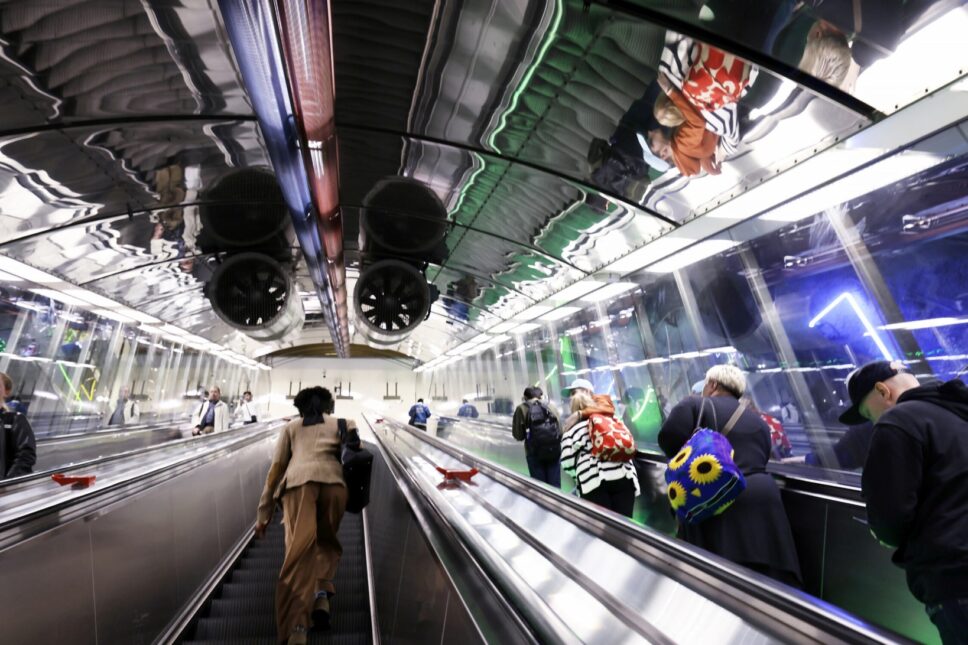 People on an escalator.